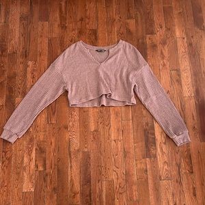 Cropped light sweater